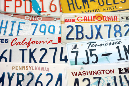 KYIV, UKRAINE - OCTOBER 18, 2025 Many US license plates of different states registration. Big amount of United States number platesのeditorial素材