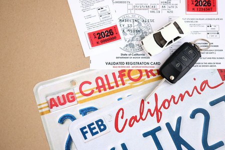 KYIV, UKRAINE - OCTOBER 1, 2025 Validated registration card on California license plate close upのeditorial素材
