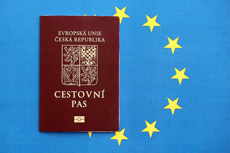 Czech biometrical passport on European Union flag background. Concept of citizenship of Czech Republicの写真素材