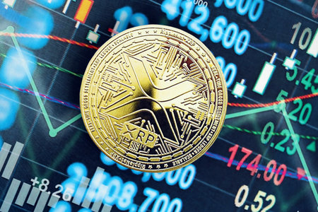 KYIV, UKRAINE - OCTOBER 9, 2025 XRP Ripple cryptocurrency coin sticker on chart values banner. Concept of modern crypto moneyのeditorial素材