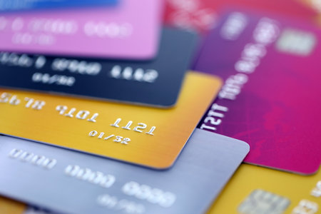 Many credit or debit cards with fictional specimen numbers. Big amount of banking plastic cards of various colors. Financial concept of business and e-commerceの写真素材