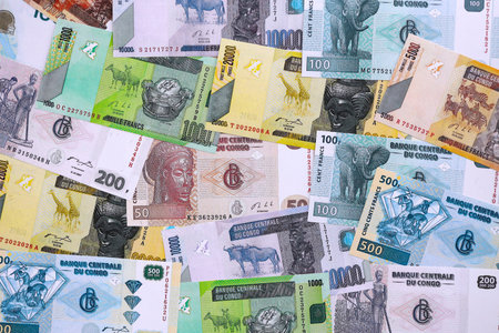 Congolese franc money bills in big amount on table close up. Rich life concept in Democratic Republic of Congo. Business and economyの写真素材