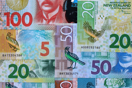 New Zealand dollar money bills in big amount on table close up. Rich life concept in New Zealand. Business and economyの写真素材