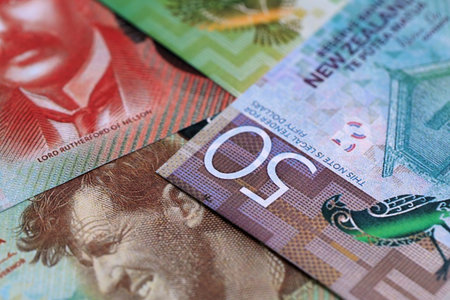 New Zealand dollar money bills in big amount on table close up. Rich life concept in New Zealand. Business and economyの写真素材