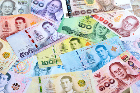 Thai baht currency money bills. The current banknotes lies on table in big amount close upの写真素材