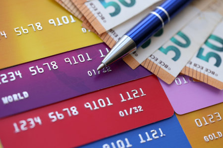Credit cards and pen with euro currency money bills. Business, financial operations and accounting in European Unionの写真素材
