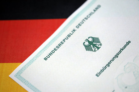 German official naturalization certificate. Symbolic for successful acquisition of German citizenship close upの写真素材