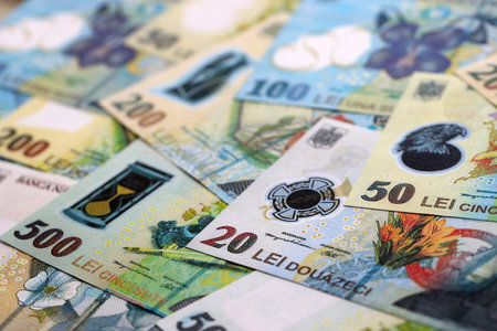 Romanian Leu currency money bills. RON currency banknotes in big amount with different denomination...