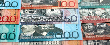 Dominican Republic Pesos currency money bills. DOP currency banknotes in bunch with different...