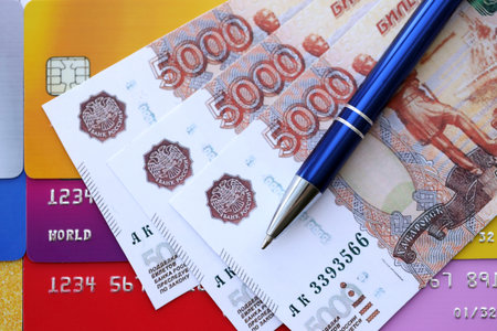 Credit cards and pen with Russian ruble currency money bills banknotes. Business, financial...