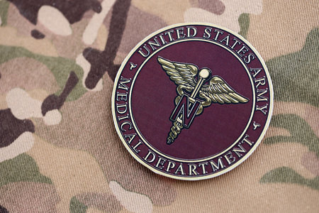 KYIV, UKRAINE - OCTOBER 7, 2025 United States Army Medical Department on multicam camouflage fabric close upのeditorial素材