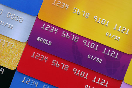 Many credit or debit cards with specimen numbers. Big amount of banking plastic cards of various...