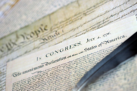 US Constitution with Declaration Of Independence and Quill Pen close up. Patriotism, Fourth of July...