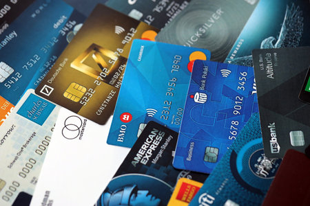 KYIV, UKRAINE - DECEMBER 8, 2025 Specimen of plastic credit and debit cards for banking from various...