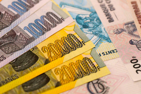 Congolese franc money bills in big amount on table close up. Rich life concept in Democratic Republic of Congo. Business and economyの写真素材