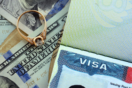 Gold ring with diamond. US Immigrant documents Visa for Immigration.