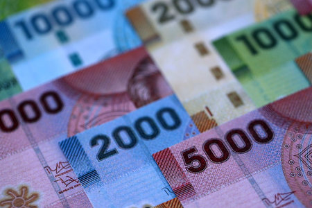 Big amount of chilean pesos money bills banknotes. Huge quantity of paper money from Chile country...
