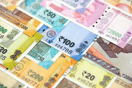 Big pile of Indian Rupees money bills banknotes close up. Lots of money of Indian INR currency cash...