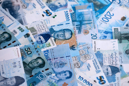 Various currencies money bills banknotes in full frame. Many cash bills from different countries in...
