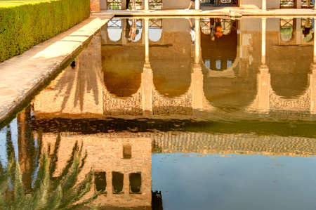 Granada, Spain - September 2020 : Alhambra gardens in sunny weather, HDR Image
