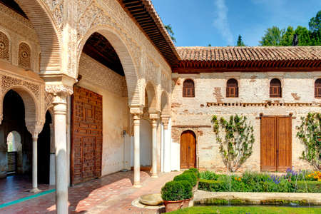 Granada, Spain - September 2020 : Alhambra gardens in sunny weather, HDR Image