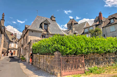 Salers, France - July 2019 : Picturesque village in sunny weather, HDR Image