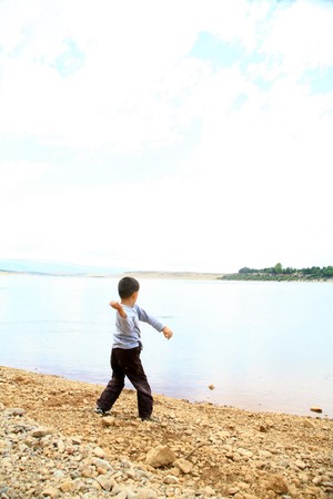 The children in the rest of the lakeside viewの写真素材