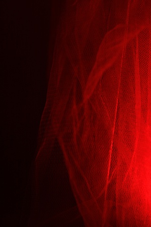 Red light is reflected through the gauze curtainの写真素材