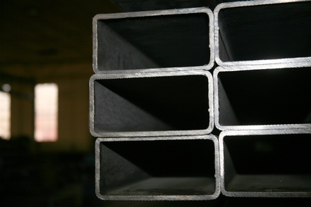 metal pipes on black backgroundの写真素材