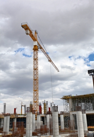 Construction workers working on scaffolding のeditorial素材