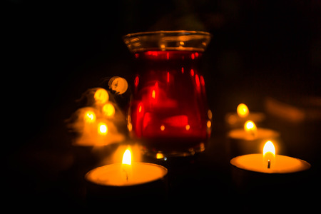 Golden light of candle flame.の写真素材