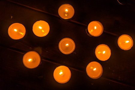 Golden light of candle flame.