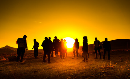 People looking at the lightの写真素材