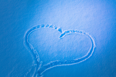 White snow with drown heart shapeの写真素材