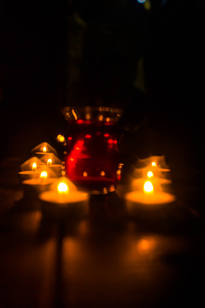 Golden light of candle flame.の写真素材