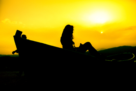 sunset photo shoot on the boatの写真素材