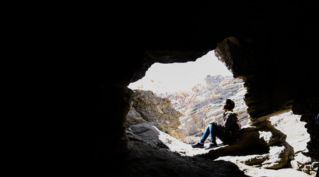 shooting a model in front of the caveの写真素材