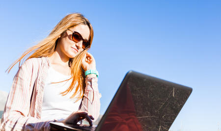 mobile working business womaの写真素材