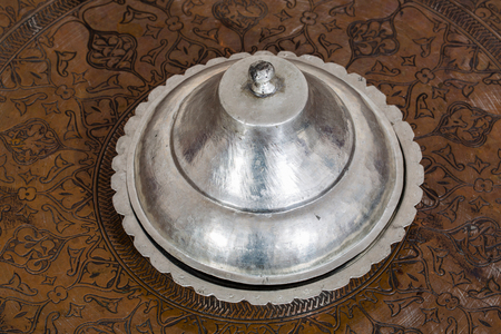 Old copper pot used for cookingの写真素材