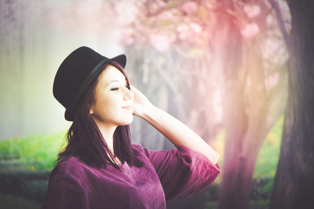 Beautiful girl drinking coffee at the coffee shopの写真素材