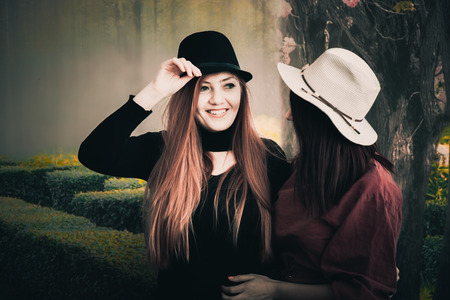 Beautiful girl drinking coffee at the coffee shopの写真素材