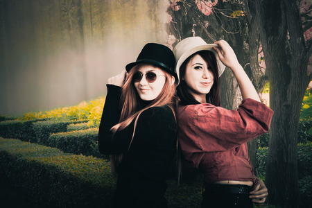 Beautiful girl drinking coffee at the coffee shopの写真素材