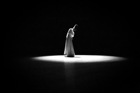 the image of a whirling Dervish in the darknessの写真素材