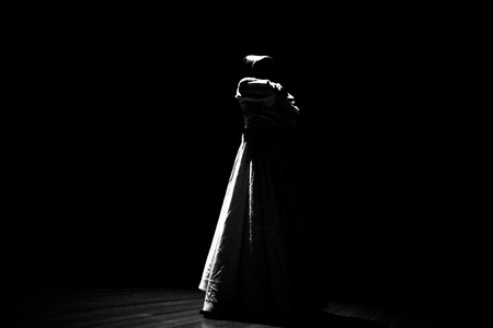 the image of a whirling Dervish in the darknessの写真素材