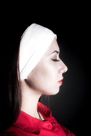 beautiful woman on black backgroundの写真素材