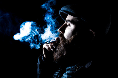 charismatic man on black groundの写真素材