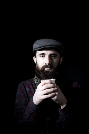 Charismatic man on black groundの写真素材