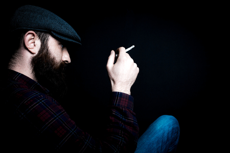 charismatic man on black groundの写真素材