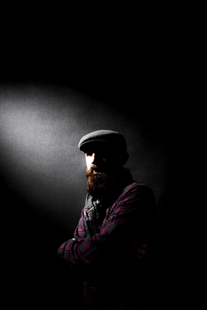 charismatic man on black groundの写真素材