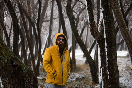 the man who is in the road that is snowの写真素材